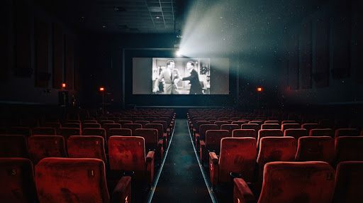 CineSofa — Butacas de sala de cine en penumbra